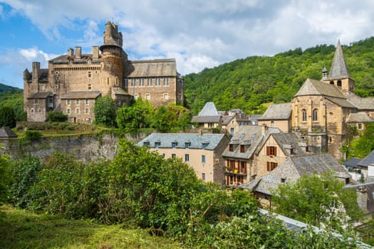 Castle and church in Estaing, one of the most beautiful villages of France, photographed in spring