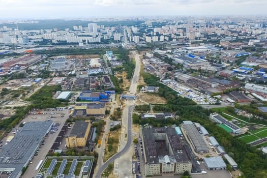 Top view of the city of Moscow, buildings and roads and other infrastructure of the city. Cityscape view from above.