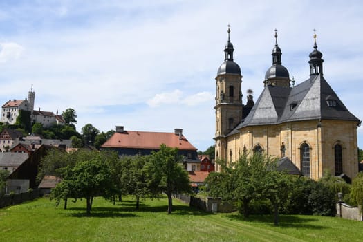 View of the pilgrimage site 91327 Gößweinstein in Franconian Switzerland,Middle Franconia,Bavaria,Germany,Europe with the Holy Trinity Basilica and the castle in the Archdiocese of Bamberg