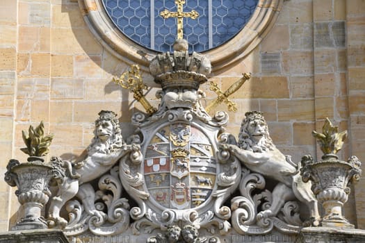Coat of arms of Friedrich Carl von Schönbronn above the main portal of the basilica 91327 Gößweinstein in Franconian Switzerland. The pilgrimage church is built in the Baroque architectural style. Goessweinstein