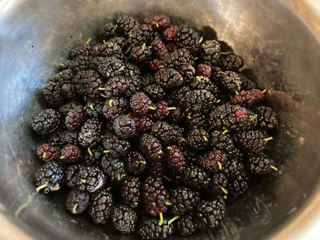 Making compote from fresh berries and the fruits