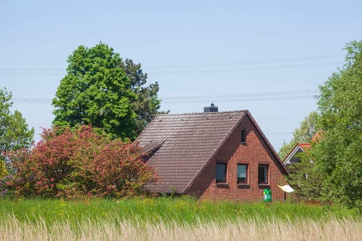 Brick residential building on the River Este, Buxtehude, Lower Saxony, Germany