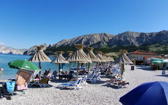 Beach scene in Baska/island of Krk  Theme picture Croatia / Hrvatska / Croatia 2024