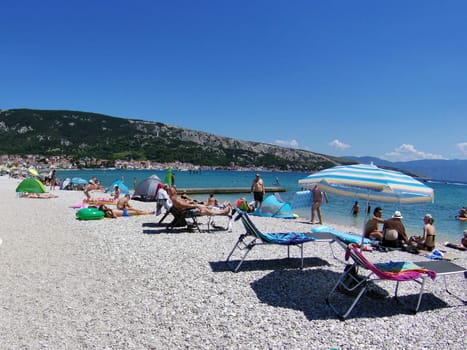 Beach scene in Baska/island of Krk  Theme picture Croatia / Hrvatska / Croatia 2024