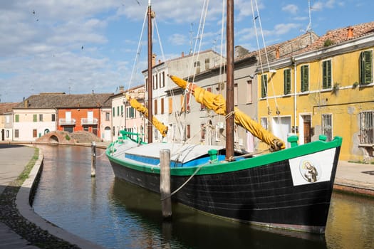 Comacchio, Italy - 11 June 2024. Characteristic village named Little Venice, with bridges and canals.