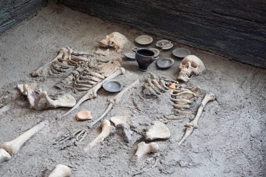 Comacchio, Italy - 11 June 2024, Etruscan tomb, inhumation of two deceased, in wodden crate. 350-300 BC.