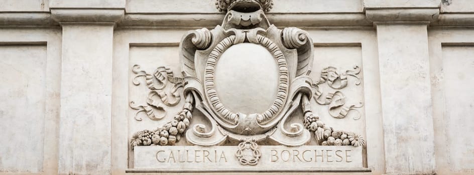 Rome, Italy - Galleria Borghese - Borghese Gallery building - symbol above the entrance of the museum