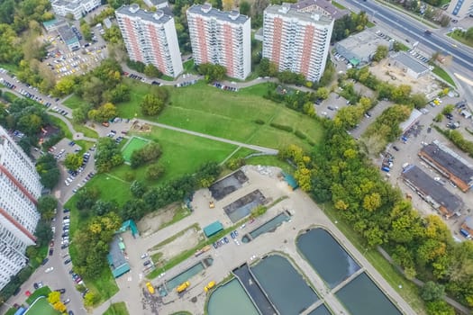 Top view of the city of Moscow, buildings and roads and other infrastructure of the city. Cityscape view from above.