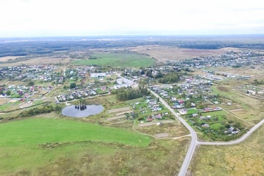 Top view of the village, fields and forests near the village