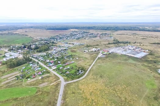 Top view of the village, fields and forests near the village