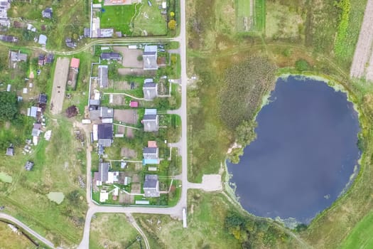 Top view of the village, fields and forests near the village