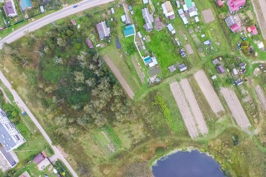 Top view of the village, fields and forests near the village