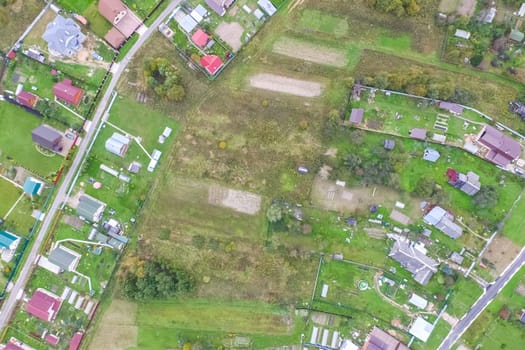 Top view of the village, fields and forests near the village