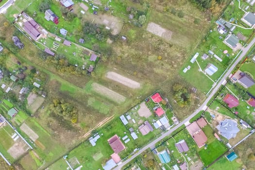 Top view of the village, fields and forests near the village