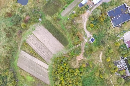 Top view of the village, fields and forests near the village