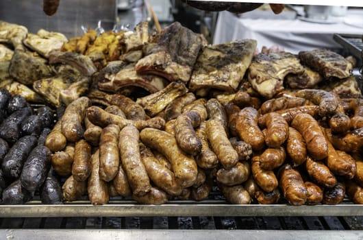 Grilled sausage on barbecue, typical food in Spain, food