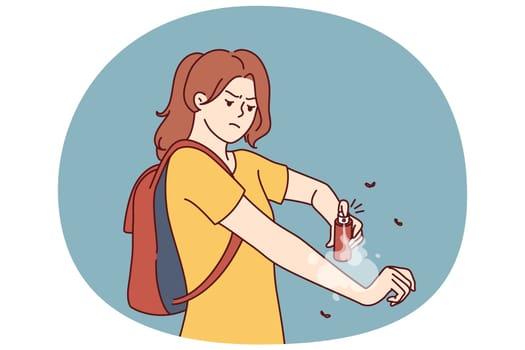 Woman hiker applies anti-malarial mosquito bite spray while hiking in wilderness in tropical area. Girl uses remedy for flying insects or ticks with mosquito that can infect person with infection