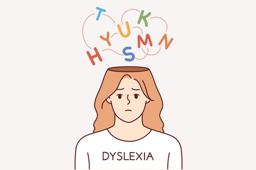 Girl suffers from dyslexia, which causes ignorance of letters and inability to read or write due to confusion in head. Problem of teenage dyslexia interferes with learning and education at school