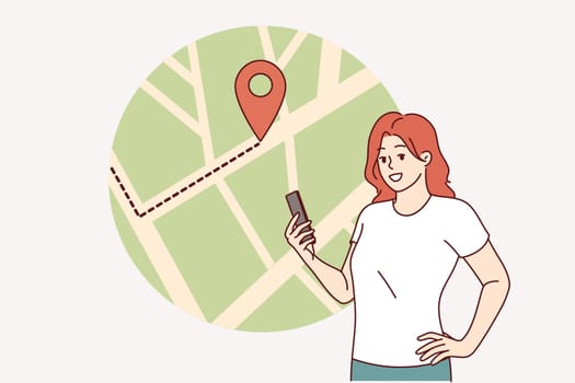 Woman uses electronic map in mobile phone to plot route or track courier delivery. Girl using modern technology to navigate in unfamiliar places with map application in smartphone.