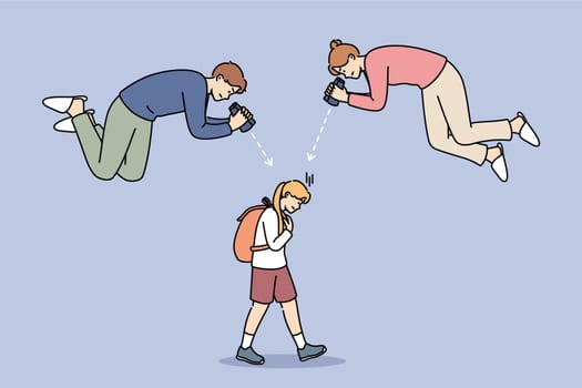Overprotection of teen girl from annoying parents watching child through binoculars. Schoolgirl walks down street suffering from overprotection of mother and father, who are causing depression.