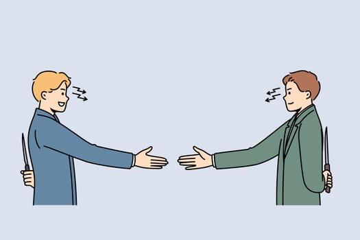 Business partners shake hands and show hypocrisy by holding knives behind backs.