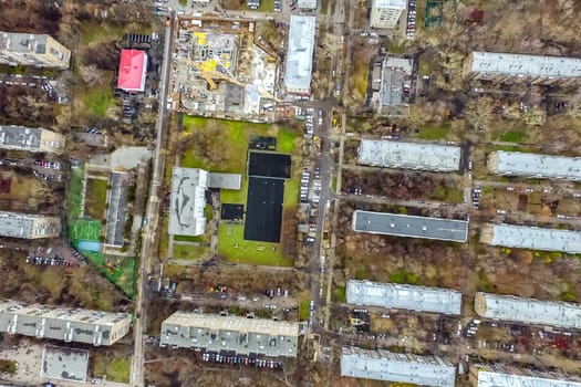 Top view of the city of Moscow, buildings and roads and other infrastructure of the city. Cityscape view from above.