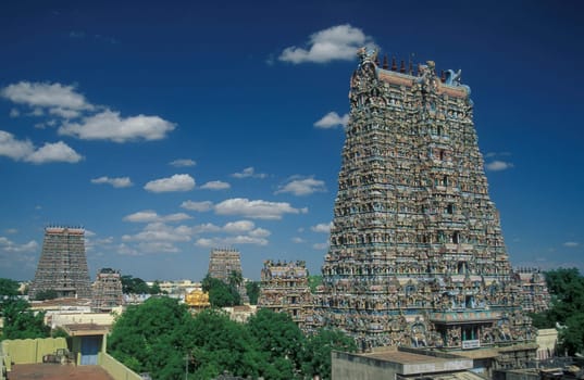 a view of the Tower of the Meenakshi Amman Temple in the city of Madurai in the Province Tamil Nadu in India.  India, Madurai, April, 1998