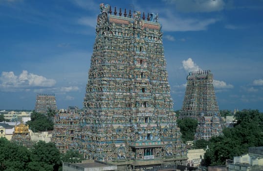 a view of the Tower of the Meenakshi Amman Temple in the city of Madurai in the Province Tamil Nadu in India.  India, Madurai, April, 1998