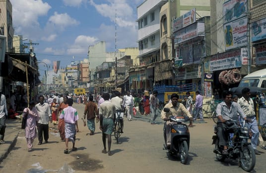 people in a street in the city of Madurai in the Province Tamil Nadu in India.  India, Madurai, April, 1998