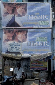 a Film Poster of Titanic in a Market street in the city of Madurai in the Province Tamil Nadu in India.  India, Madurai, April, 1998