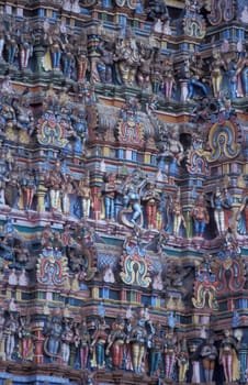 Hindu carving figures at a Tower of the Meenakshi Amman Temple in the city of Madurai in the Province Tamil Nadu in India.  India, Madurai, April, 1998