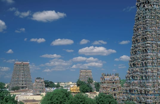 a view of the Tower of the Meenakshi Amman Temple in the city of Madurai in the Province Tamil Nadu in India.  India, Madurai, April, 1998