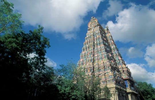 a view of the Tower of the Meenakshi Amman Temple in the city of Madurai in the Province Tamil Nadu in India.  India, Madurai, April, 1998