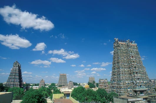 a view of the Tower of the Meenakshi Amman Temple in the city of Madurai in the Province Tamil Nadu in India.  India, Madurai, April, 1998