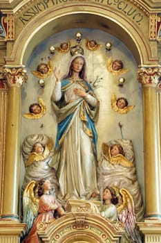Assumption of Mary, statue on the main altar in the parish church of the Assumption of the Virgin Mary in Pescenica, Croatia