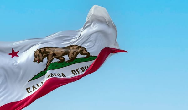 California State flag waving in the wind on a clear day. California flag is also the Bear Flag. 3d illustration render. Rippled Fabric.