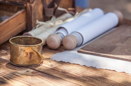 Ancient roman writing and documents management implements. Military scribe table