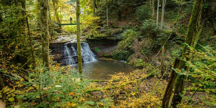 Waterfall river wieslauf with forest in Germany autumn