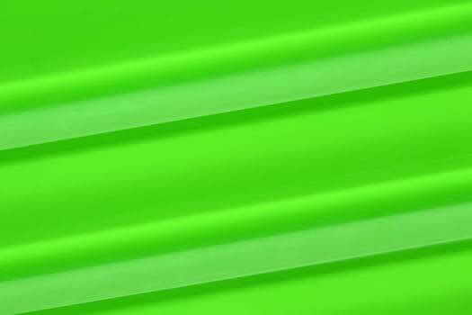 Close-up of a can green background made of glass