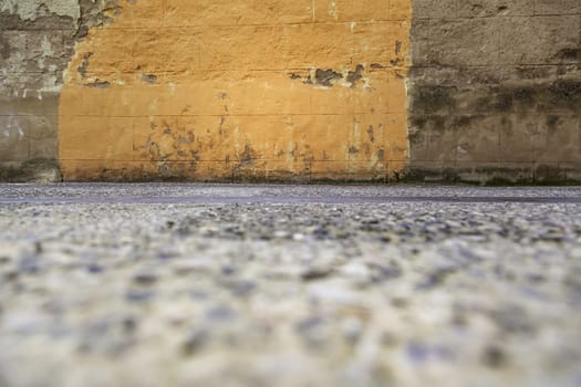 Rough cement wall with stains, construction and architecture