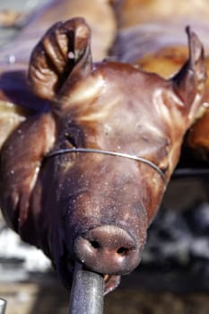 Detail of roast pork at a street celebration, food