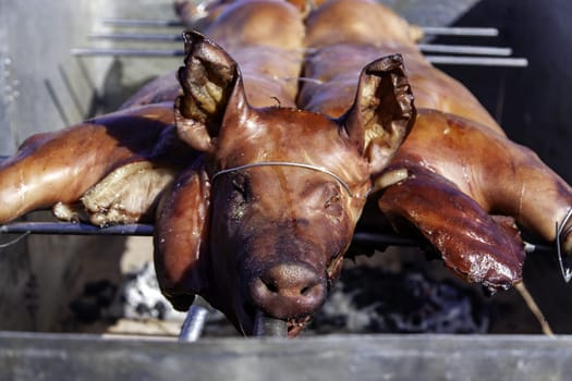 Detail of roast pork at a street celebration, food