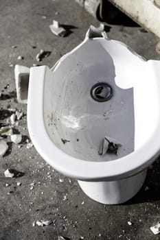 Detail of old and used toilet bowl, dirt and destruction