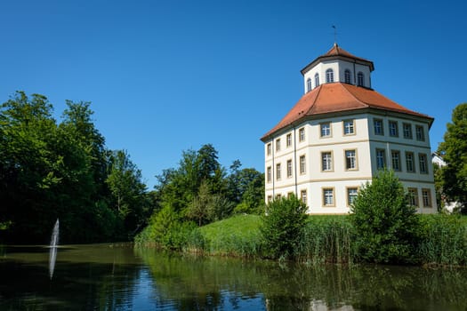 City hall of former water castle building with lake
