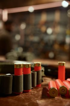 Bullets cartridge and belt chain for storage in weapon shop. Hunter armament and munitions assortment