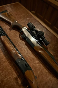 Large-caliber equipped gun for hunting with and without sight presentation. Concept of weapon shop armament assortment