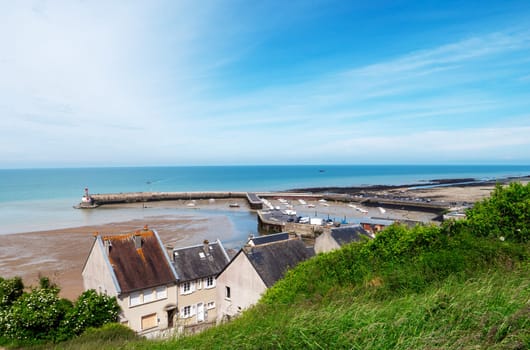 view of town of Port-en-Bessin, a commune in the Calvados department in the Basse-Normandie region in northwestern France.
