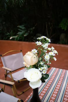 A coffee shop terrace with tables and chairs, stock photo