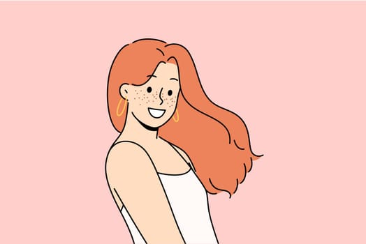 Attractive woman with freckles on face smiles and looks at screen demonstrating natural beauty without using makeup. Cheerful teenage girl with freckles experiences sparkling emotions and smiles