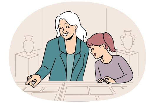 Little girl visits museum with grandmother and looks at antique exhibits found by archaeologists. Curator of museum conducts tour for child interested in history and ancient artifacts